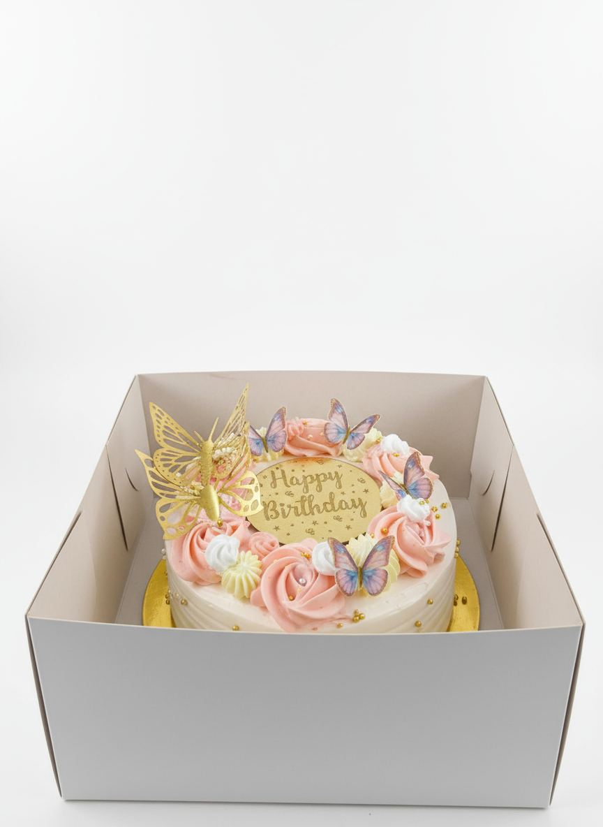 Professional birthday cake presentation in bakery box