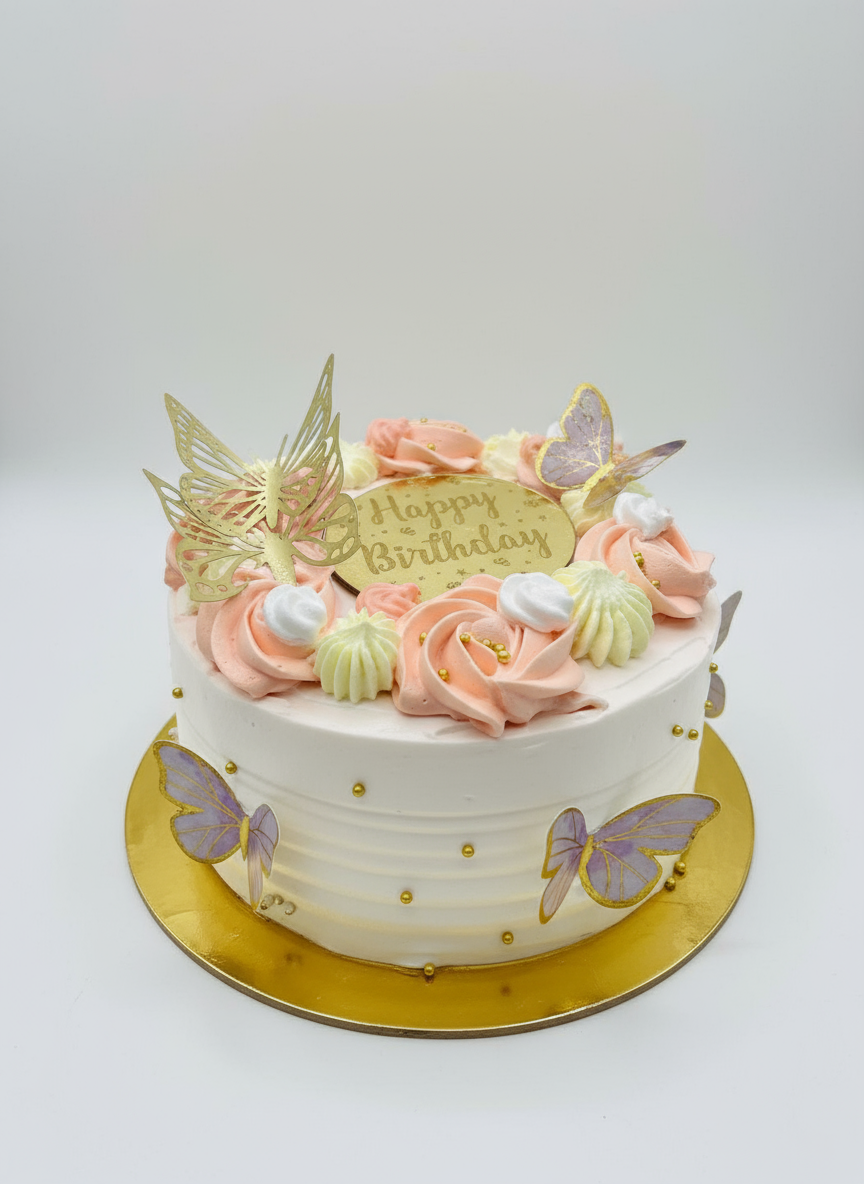 Elegant birthday cake with butterflies and pastel decorations